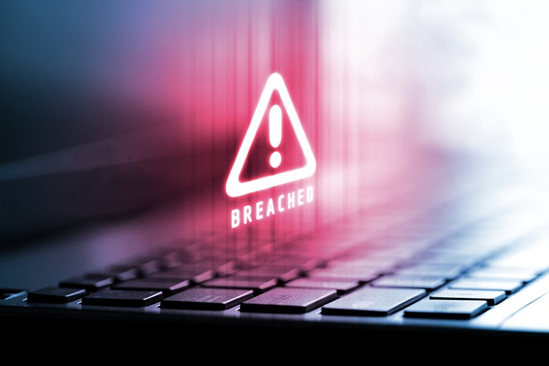 Data breach alert on a laptop